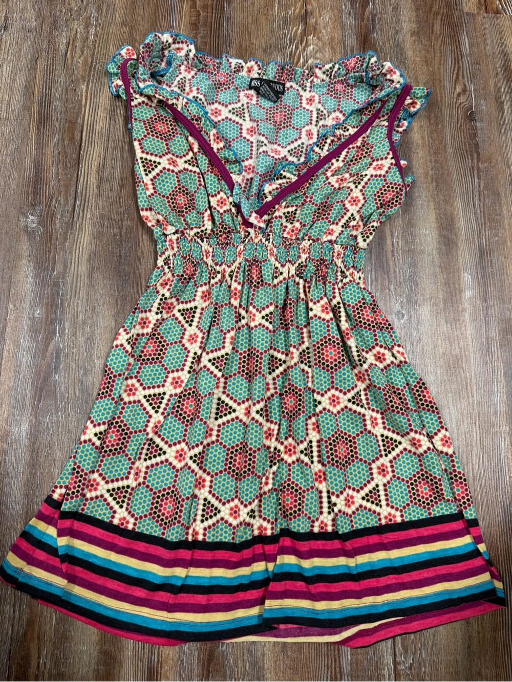 Y2K Miss Chievo top with geometric hexagon pattern in teal, red, and cream with
